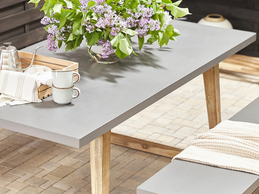 Table de salle à manger de jardin 180 x 90 cm - Plateau en ciment gris et pieds en bois d'acacia - 6 places