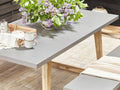 Table de salle à manger de jardin 180 x 90 cm - Plateau en ciment gris et pieds en bois d'acacia - 6 places